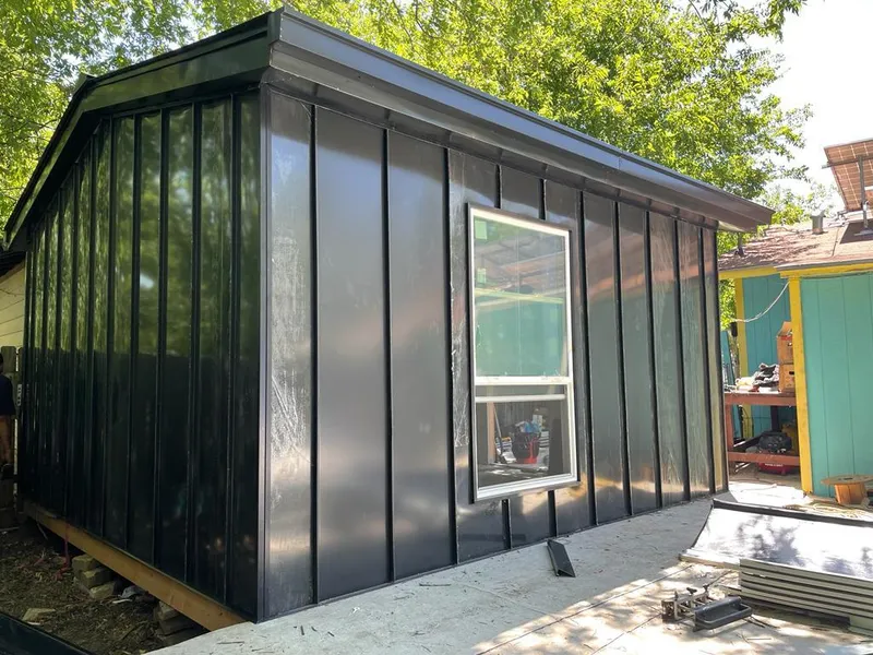 Black standing seam metal wall panels for Metal Roof Installation in Neptune